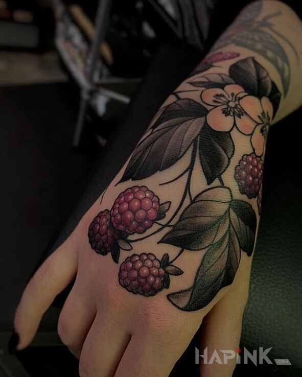 Tattoo Maliny in colorful motif and graphic / illustrative style on the wrist