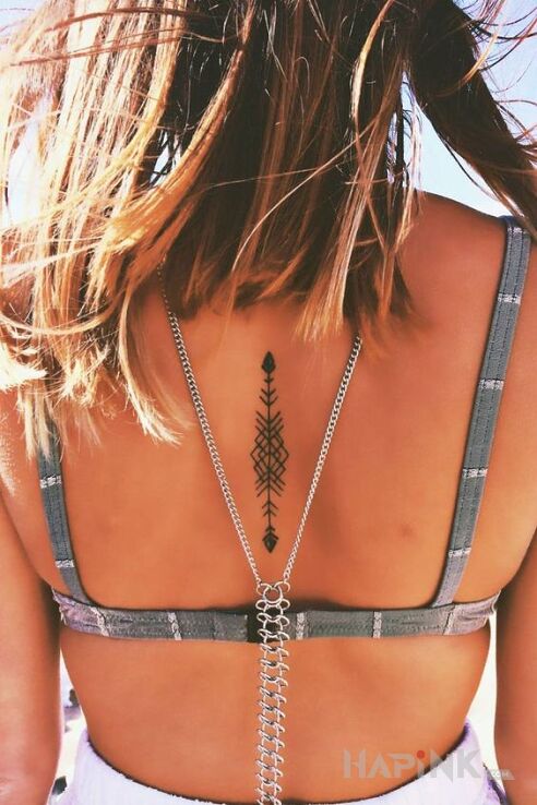 Tattoo Strzała in other motif and minimalistic style on the back