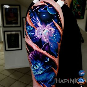 Tattoo Cosmos on the upper arm motif: cosmos style: graphic / illustrative