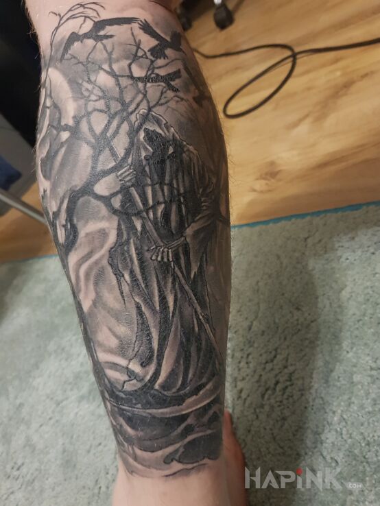 Tattoo Śmierć in dark motif and graphic / illustrative style on the calf