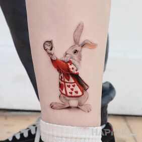 Tattoo Cute bunny near the ankle motif: colorful style: graphic / illustrative