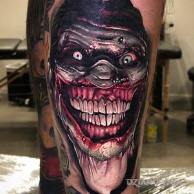 Tatuaż Piękny uśmiech :) na łydce motyw: mroczne styl: realistyczne