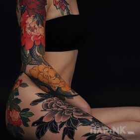 Tattoo All in flowers on the leg motif: flowers style: japanese / irezumi