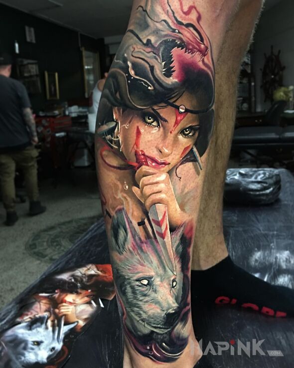 Tattoo Dziewczyna z wilkiem in faces motif and graphic / illustrative style on the calf
