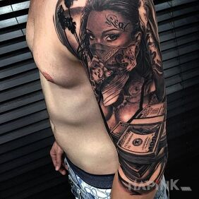 Tattoo Real dollars on the upper arm motif: faces style: realistic