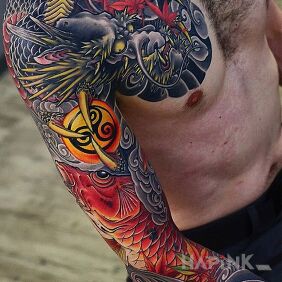 Tattoo Dragon and koi carp on the forearm motif: sleeves style: japanese / irezumi