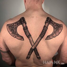 Tattoo Two axes on the shoulder blades motif: 3D style: realistic