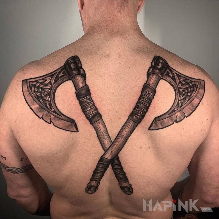 Tattoo Dwa topory in objects motif and realistic style on the shoulder blades