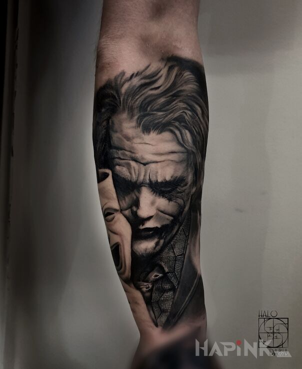 Tattoo Joker in 3D motif and realistic style on the forearm