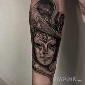 Tattoo Mask on the forearm motif: black and gray style: realistic