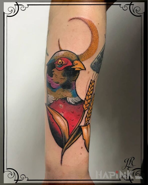 Tattoo Bażant in colorful motif and neo-traditional style on the forearm