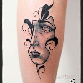 Tattoo Mask on the calf motif: faces style: graphic / illustrative