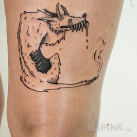 Tattoo Wolf on the leg motif: black and gray style: graphic / illustrative
