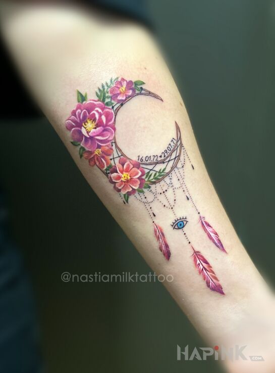 Tattoo Księżyc in ornaments motif and realistic style on the forearm