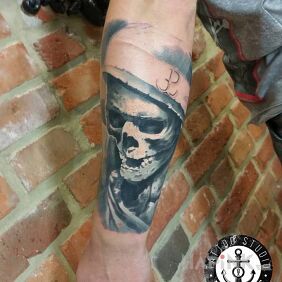 Tattoo Soldier on the forearm motif: war style: realistic