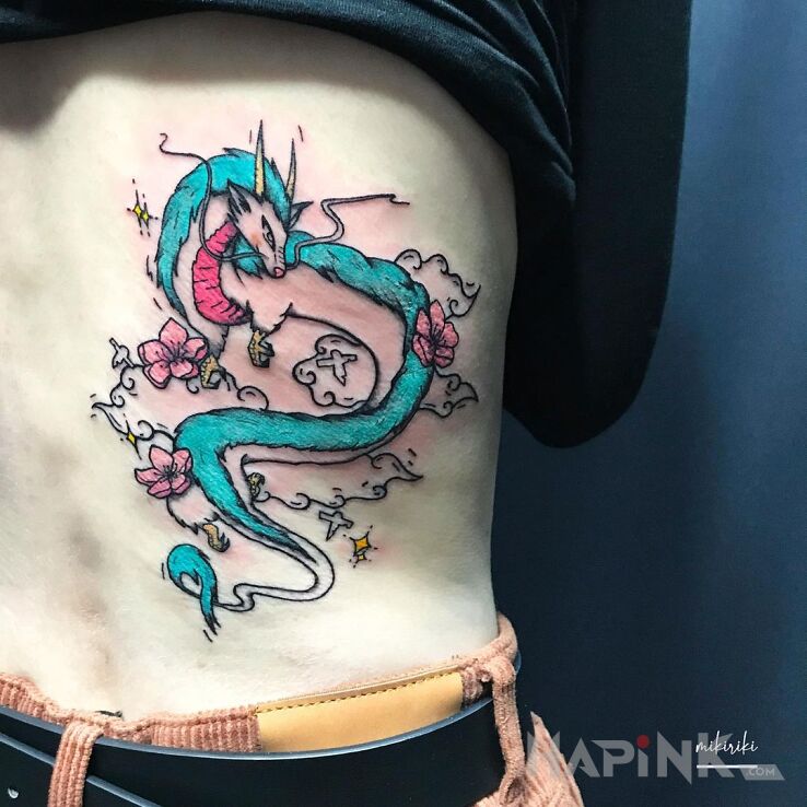 Tattoo Haku in flowers motif and graphic / illustrative style on the back