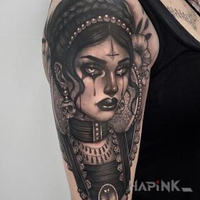 Tattoo Tears from the eyes on the upper arm motif: faces style: realistic