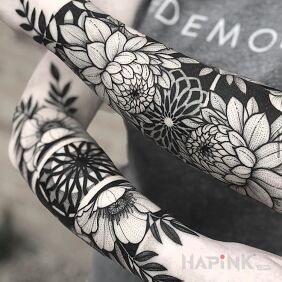 Tattoo Flower Power on the forearm motif: flowers style: graphic / illustrative