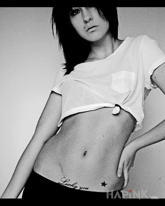Tattoo Lucky you in sexy motif on the stomach