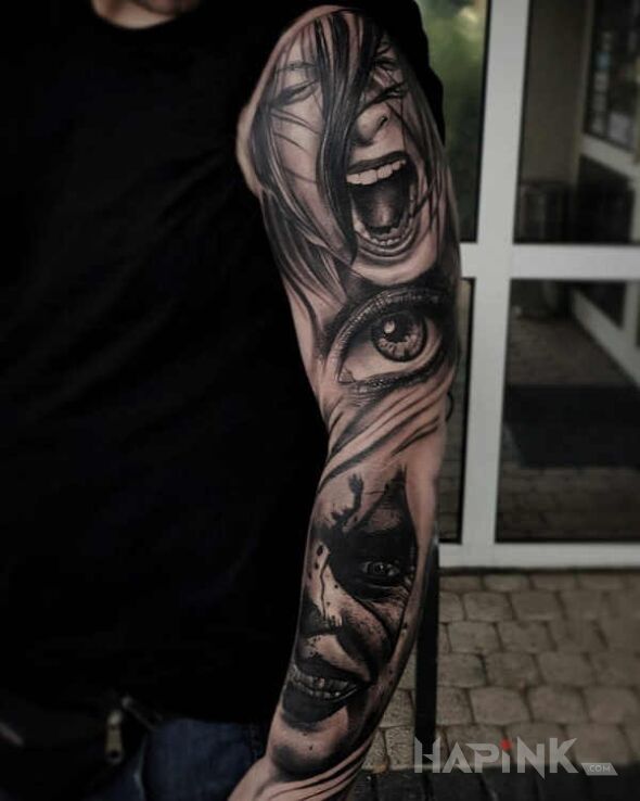 Tattoo Krzyk in black and gray motif and realistic style on the upper arm