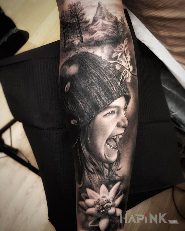 Tattoo Szczęśliwa dziewczynka in faces motif and realistic style on the forearm