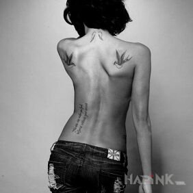 Tattoo Birds on a Blade on the back motif: sexy