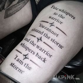 Tattoo Warrior's Whisper on the leg motif: lettering style: calligraphy