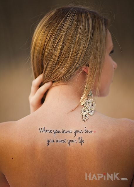 Tattoo Inwestycja in lettering motif and calligraphy style on the back