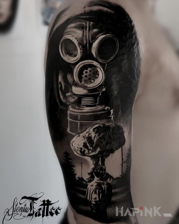 Tattoo Boom ! in war motif and realistic style on the upper arm