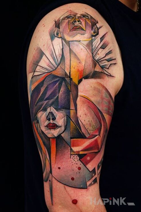 Tattoo Kubistyczne twarze in faces motif and modern / cubism style on the upper arm