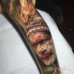 Tattoo Man from the bush on the leg motif: characters style: realistic