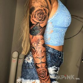 Tattoo Full sleeve tattoo on the upper arm motif: animals style: realistic
