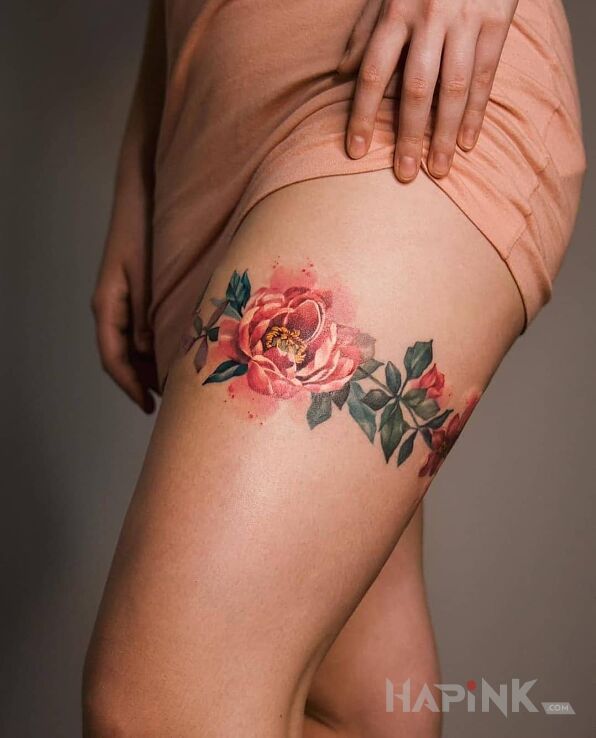 Tattoo Opaska z kwiatów in colorful motif and realistic style on the leg