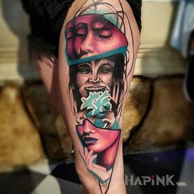 Tattoo Two heads on the leg motif: 3D style: surrealistic