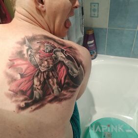 Tattoo My first ? on the shoulder blades motif: characters style: realistic