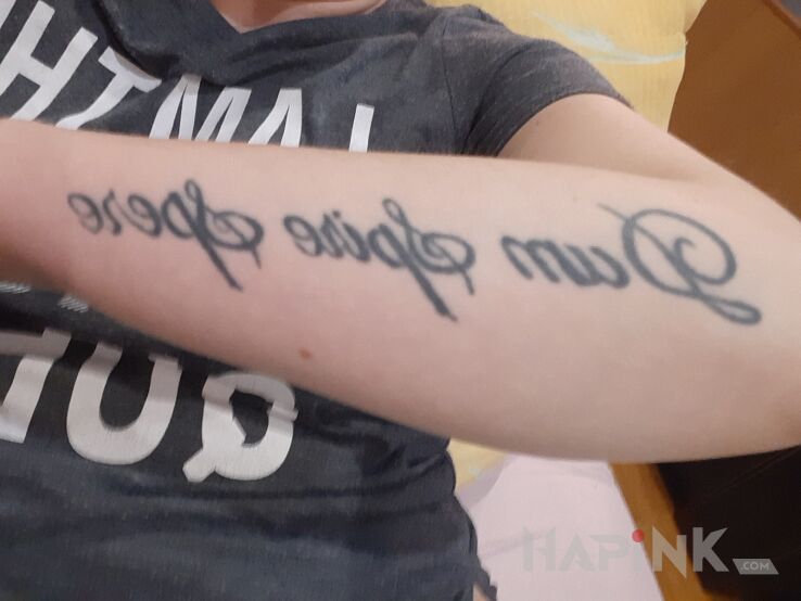 Tattoo Dum spiro spero in lettering motif and calligraphy style on the forearm