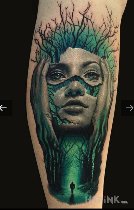 Tattoo Piękno w czystej postaci in colorful motif and surrealistic style on the upper arm