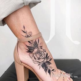 Tattoo Little Rose on the foot motif: black and gray style: realistic