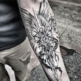 Tattoo Sketch archangel on the forearm motif: black and gray style: sketch