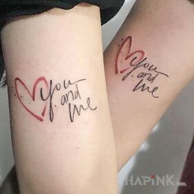 Tattoo You and me on the upper arm motif: Love style: calligraphy