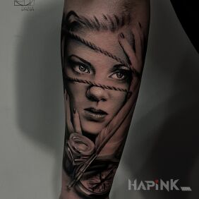 Tattoo Portrait of a woman on the forearm motif: faces style: realistic