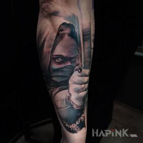Tattoo Archer on the forearm motif: black and gray style: realistic