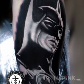 Tattoo Batman on the calf motif: characters style: realistic