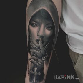 Tattoo Nun on the forearm motif: faces style: realistic