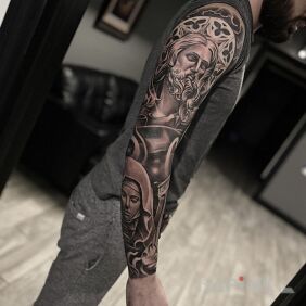 Tattoo Jesus and Mary on the upper arm motif: faces style: realistic