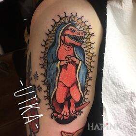 Tattoo Dinosaurrrr on the upper arm motif: colorful style: graphic / illustrative