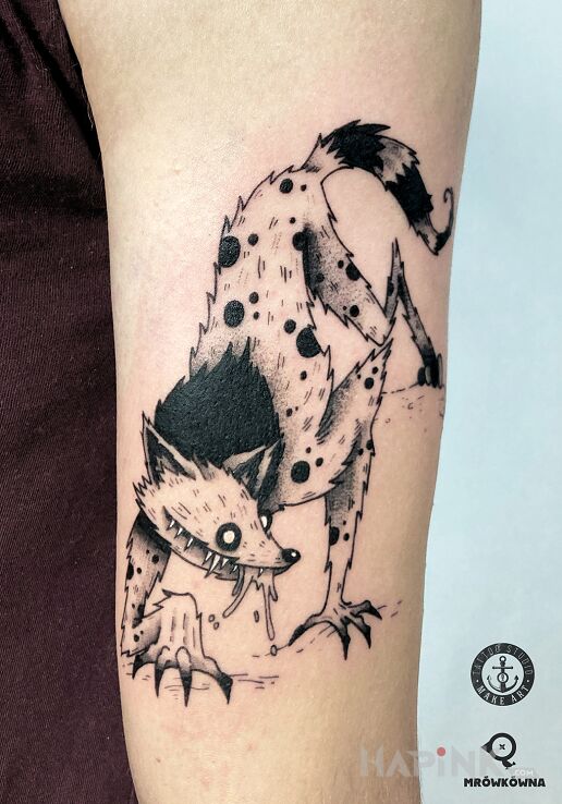 Tattoo Demoniczny wilk in dark motif and graphic / illustrative style on the upper arm