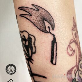 Tattoo Matchstick on the forearm motif: black and gray style: graphic / illustrative