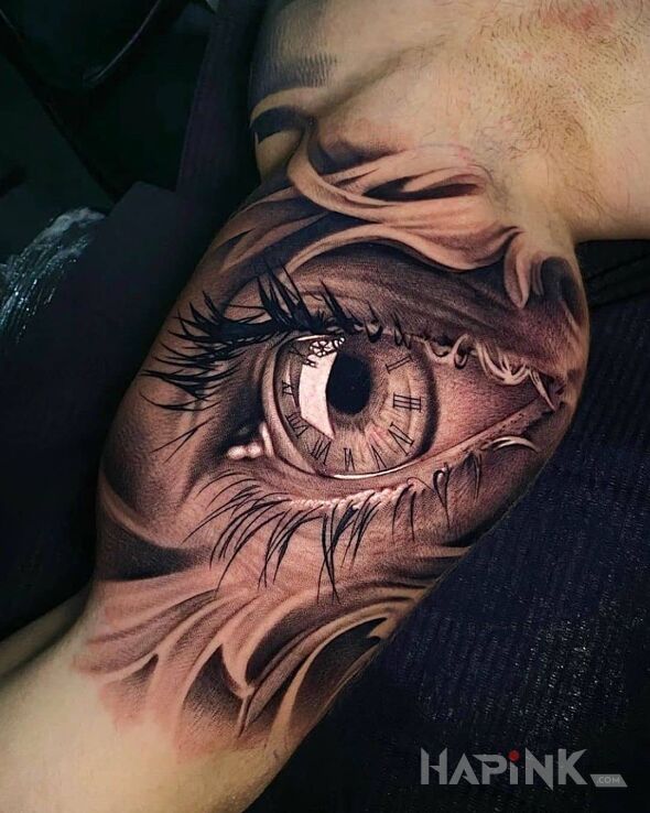 Tattoo Hiper oko in other motif and realistic style on the upper arm