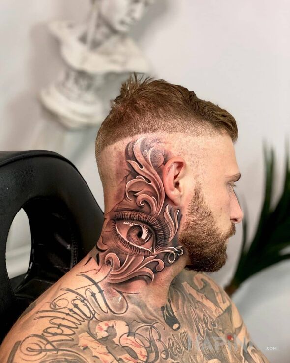 Tattoo Kolejne dobre oczysko in other motif and realistic style on the neck